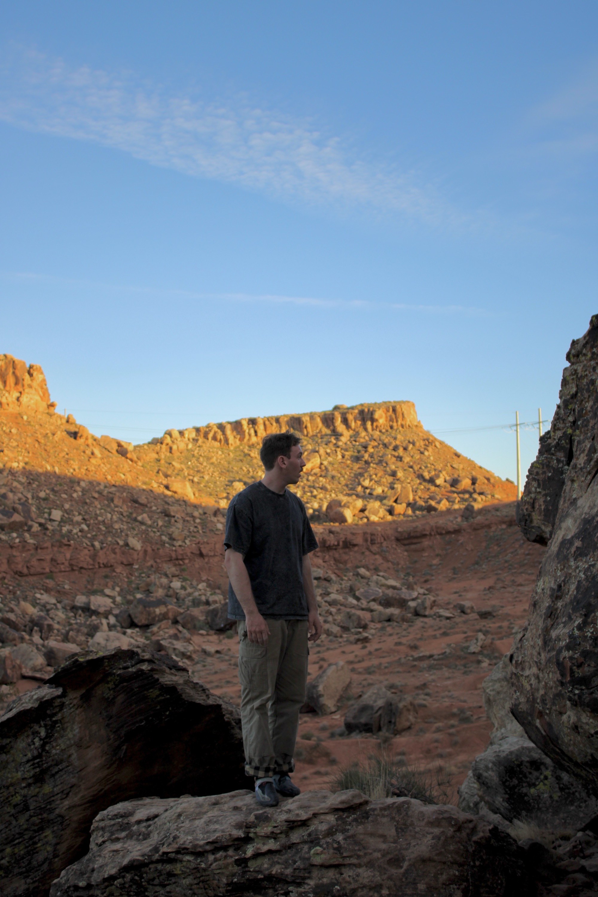Adventure portrait between rock formations at dusk